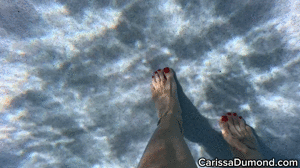 www.carissadumond.com - Carissa underwater in the hibiscus bikini with pedicured toes and wrinkled soles thumbnail